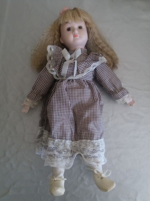 Bonecas em porcelana