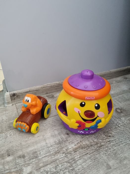 Fisher Price garnuszek na klocuszek + jeżdżący bóbr