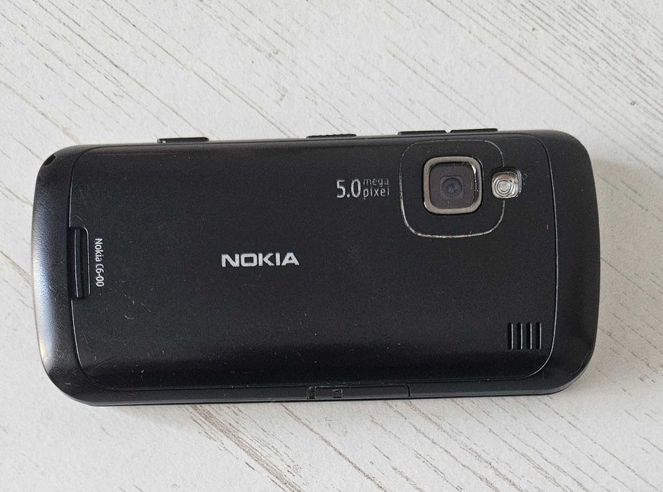 Nokia C6-00  бічний слайдер
