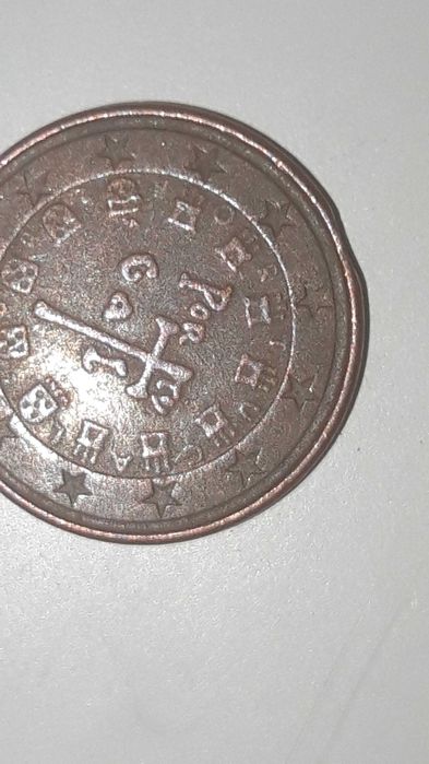 3 moedas de 1 centimo com defeito.