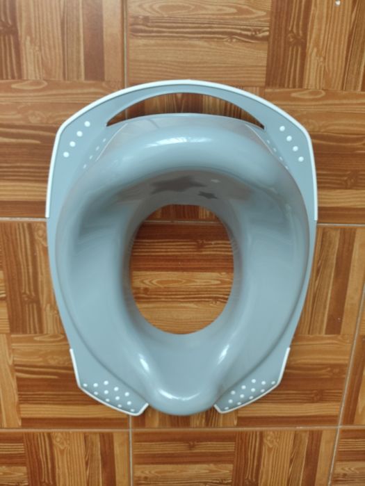 Redutor sanita de criança como novo