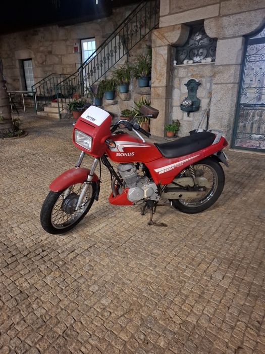 Mota 125 Sanyang   a trabalhar com documentos barata