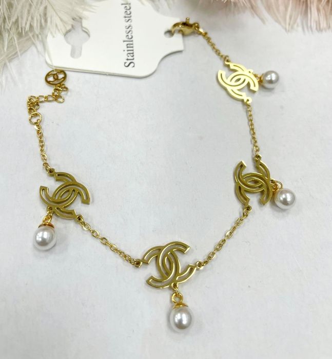 Bransoletka cc z wiszącymi perełkami