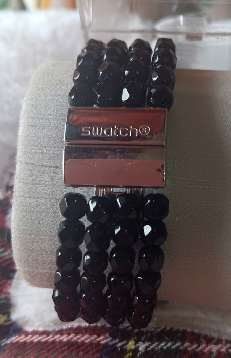 Relogio pulseira marca  swatch e anel da Tous novos