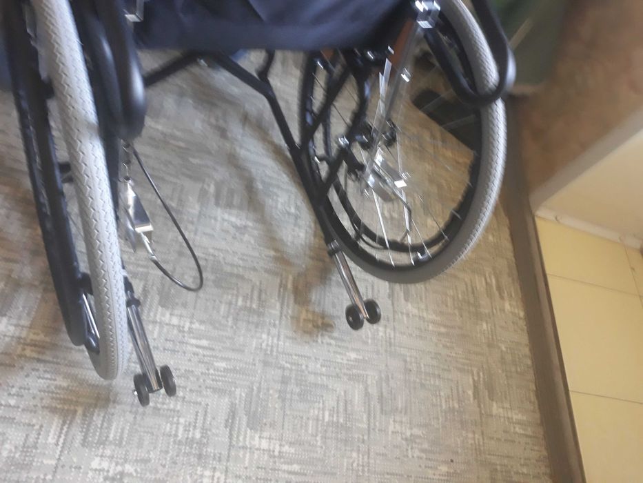 Новая инвалидная коляска.