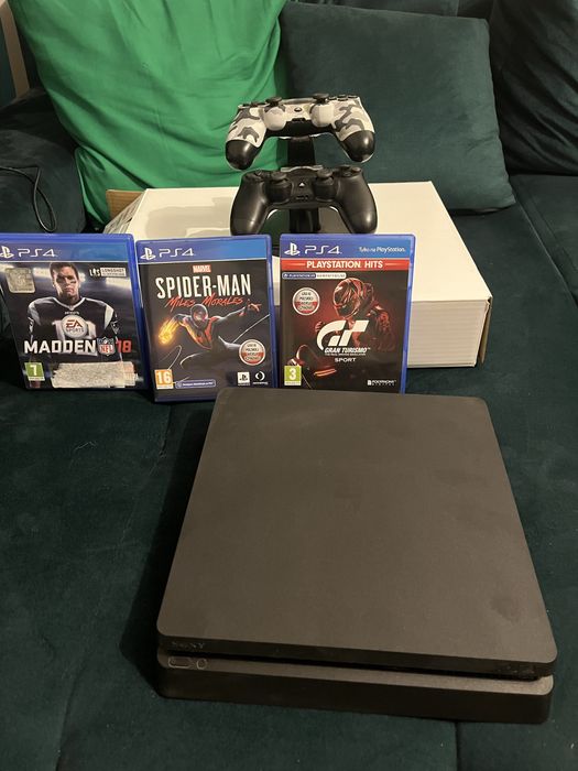Playstation 4 Slim 1TB + 2 pady + 3 gry + stacja ładująca