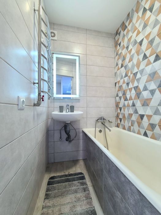 Затишна студія в центрі з балконом і видом на місто