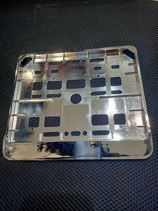 Ramka tablicy rej.  srebrna chromowana motocyklowa