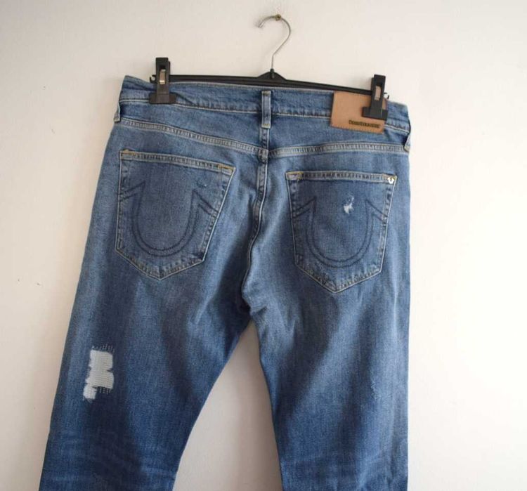 True Religion
Jeansy Zwężane przecierane w32 m męskie