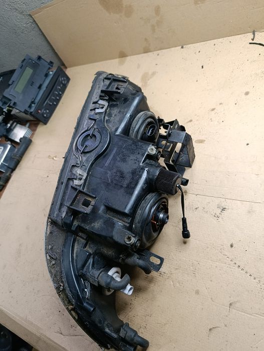 BMW E39 lift 03r-reflektor lewy Hella Europa Xenon