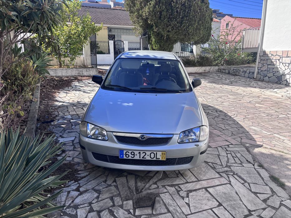 Mazda 323 ano 99