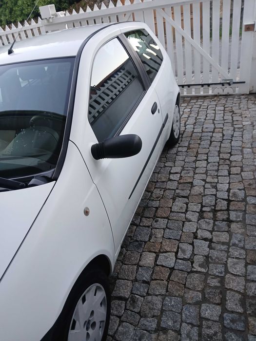 Fiat punto nacional poucos quilómetros