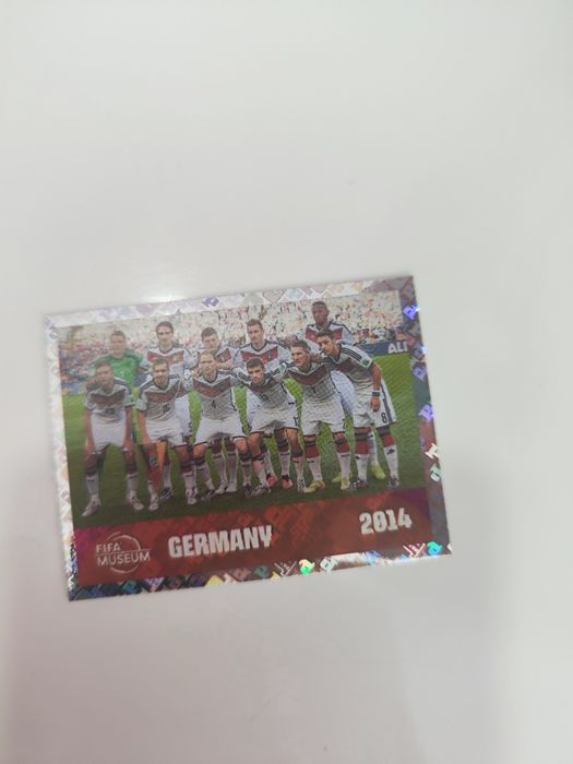 Stickers panini mundial 2026, 00, Alemanha brilhante e a brilhante do Qatar