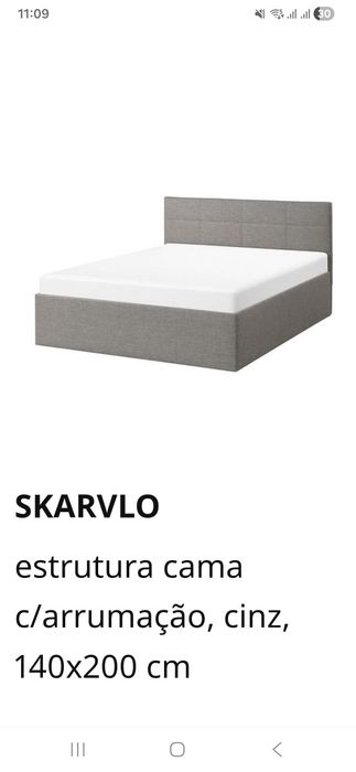 Cama com colchão e arrumação