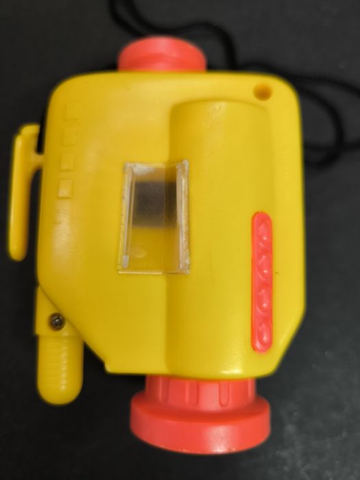 Brinquedo Câmera Fatima Amarela e Laranja.