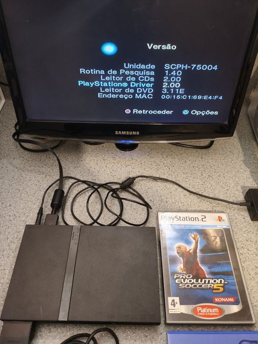 PlayStation 2 + comando + jogos