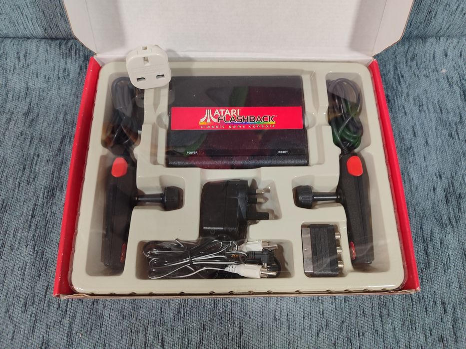 Atari Flashback 1
New, never used.

Box with some damage64586494134530122