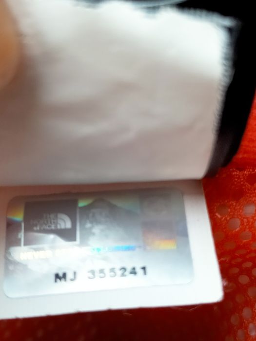 The North Face oliwkowa kurtka, wiatrówka z kapturem