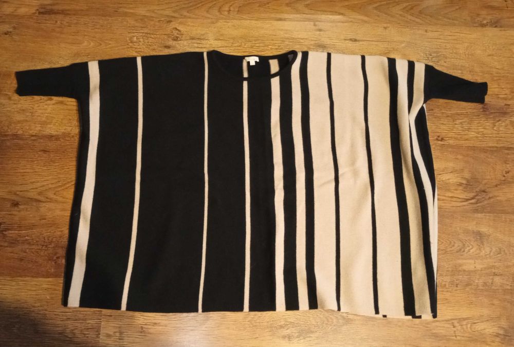 Solar poncho swetr