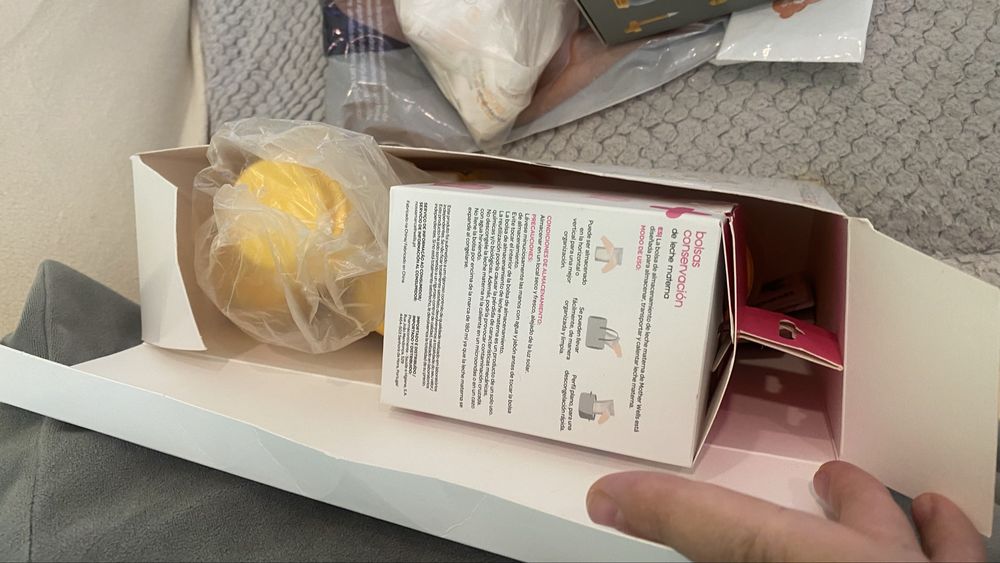 Frascos medela e tetina calma com sacos de armazenamento