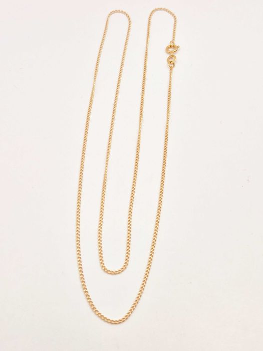 Łańcuszek wykonany ze złota próby 585 (14K).  60CM JAK NOWY!