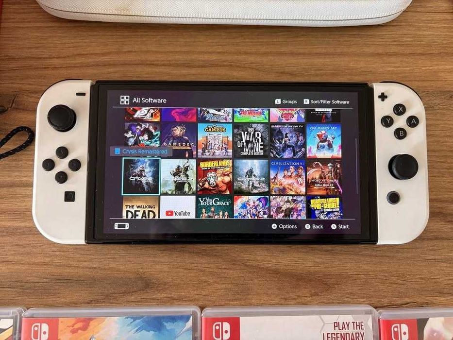 Sprzedam Nintendo Switch OLED 64GB + gry