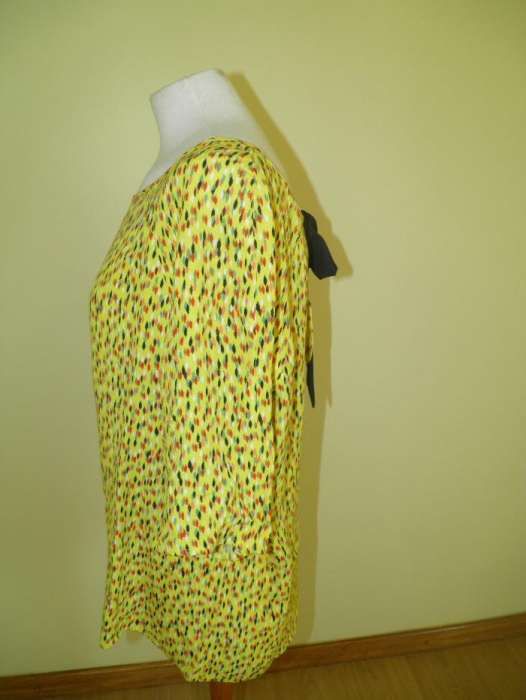 Camisa ¾ de manga, muito leve, jovial e eclética