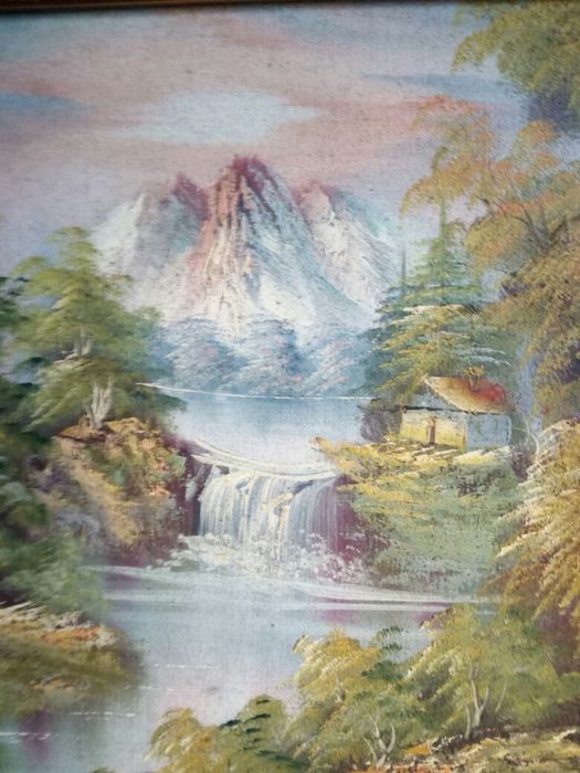 Quadro com moldura dourada