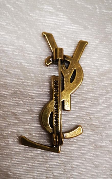 Broszka ysl stare złoto 4,5 cn