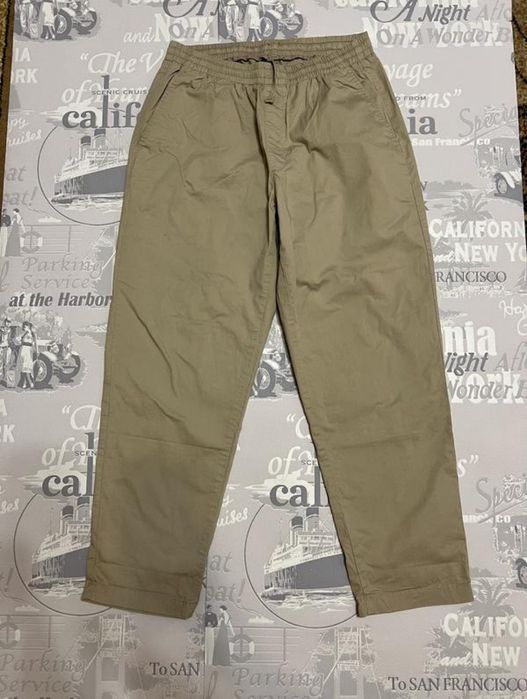 Бежеві чіноси Uniqlo