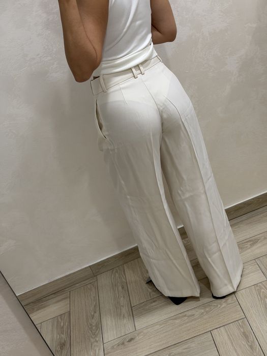 Нові широкі штани палаццо H&M зі стрілками (колір молочний)