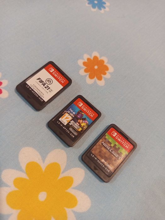 Nintendo Switch Lite + 3 Jogos