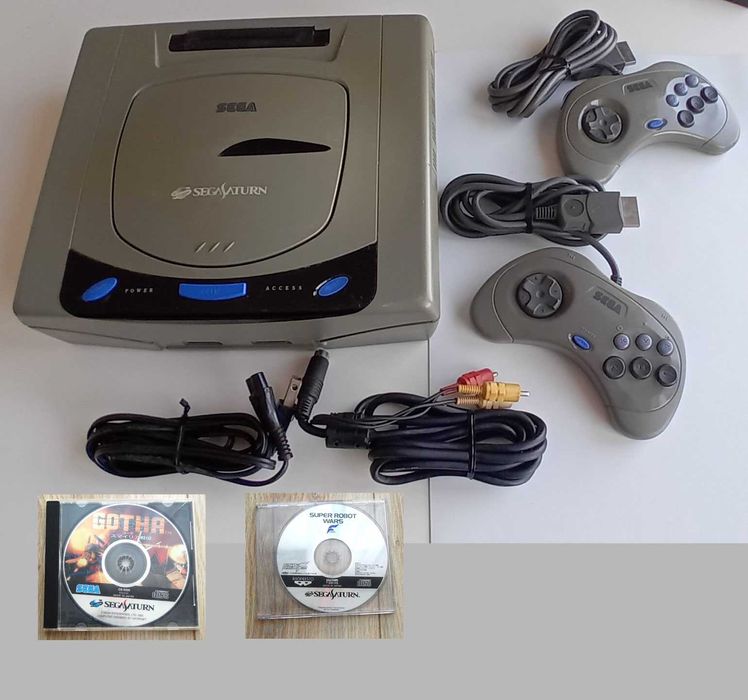 Sega Saturn HST-3200 + 2 pady HSS-0101 kable Japonia NTSC-J + 2 gry