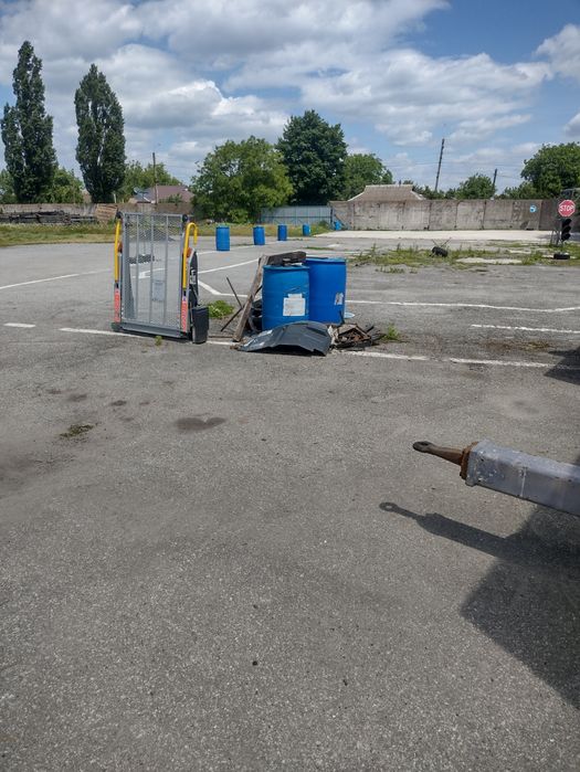 Заасфальтована огороджена площадка(майданчик)для різних потреб