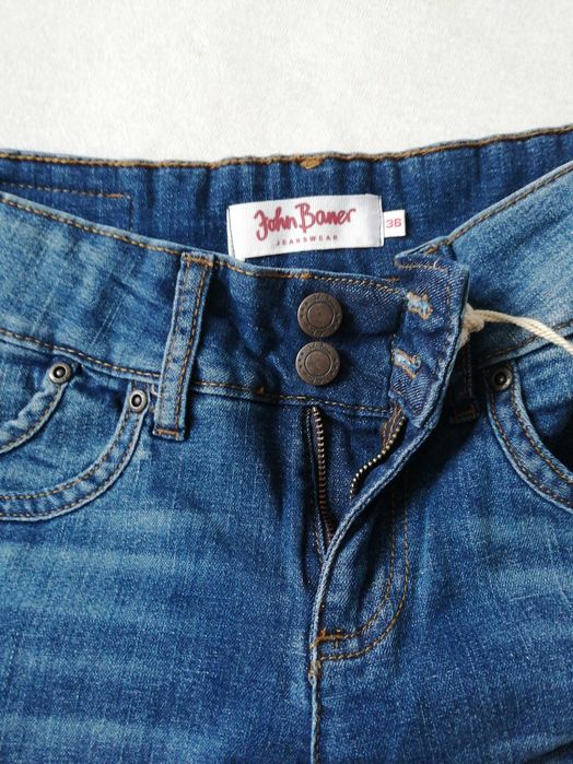 Nowe spodnie jeansowe dzwony 38 M