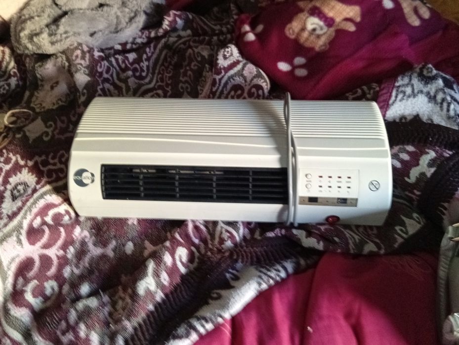 1aquecedor de parede com comando