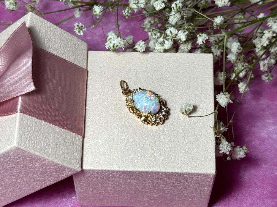 Złota zawieszka z opalem 2,80g p.585