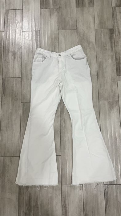 white flared jeans