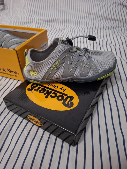 Sprzedam dla chłopca buty i kurtke 134 roz.