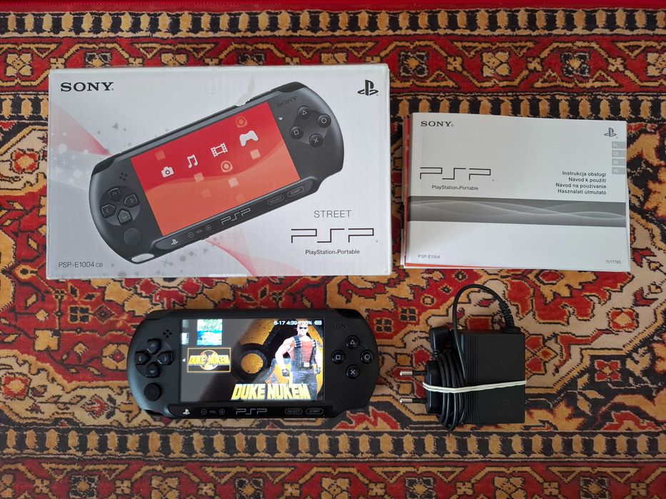 Konsola PSP Street e1004 przerobiona ARK-4 z grami, pudełkiem i zasilaczem