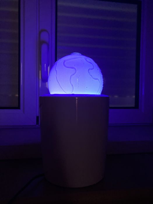 Lampada multicolor com água