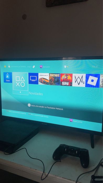 Ps4 com comando  e 6 jogos