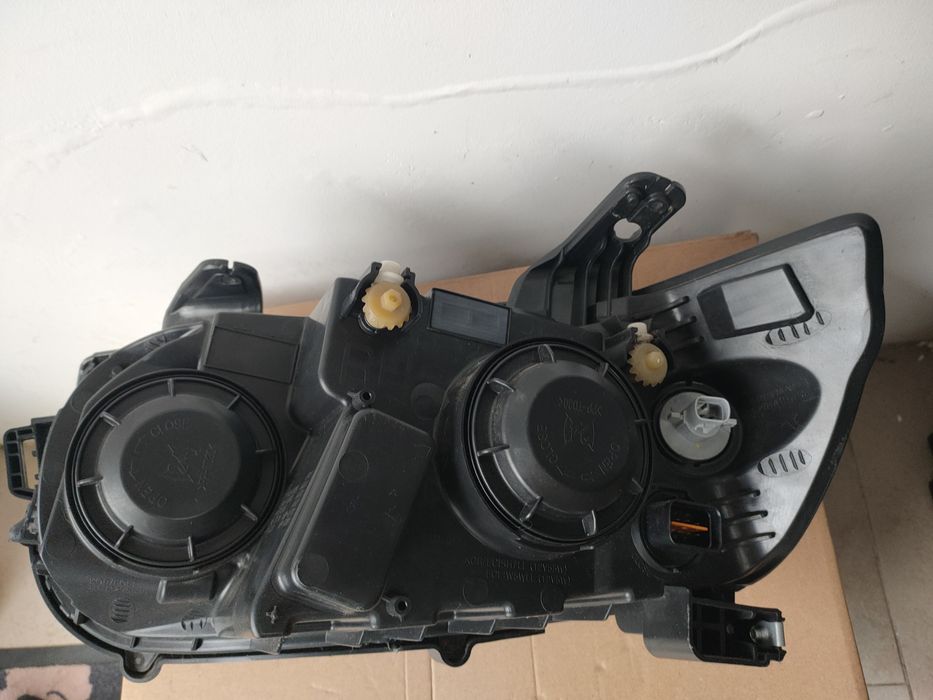 Farol ESQ e DRT CHEVROLET AVEO Hatchback (T300)