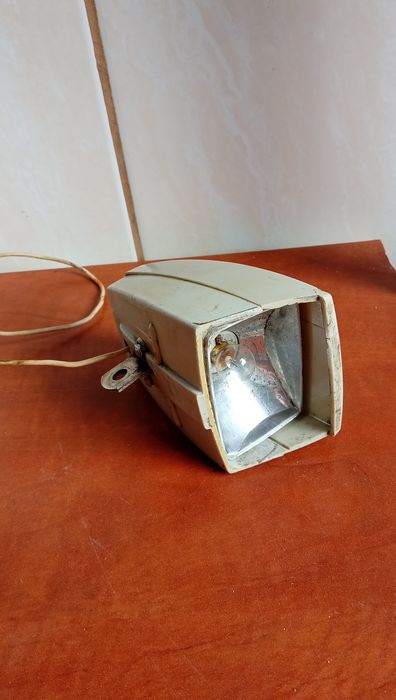 Biała lampka przednia rowerowa Romet