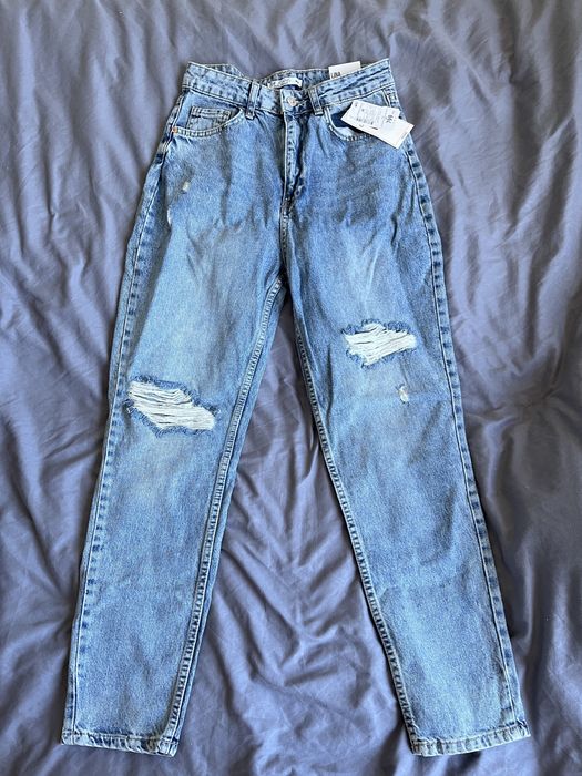Джинси Mom, Рвані джинси
