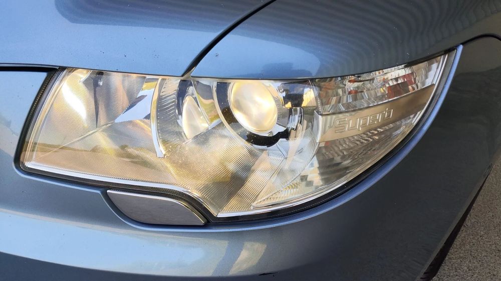 LAMPA REFLEKTOR XENON SKRĘTNY KOMPLETNY LEWY PRZÓD ŁADNY STAN SKODA SUPERB II 2
