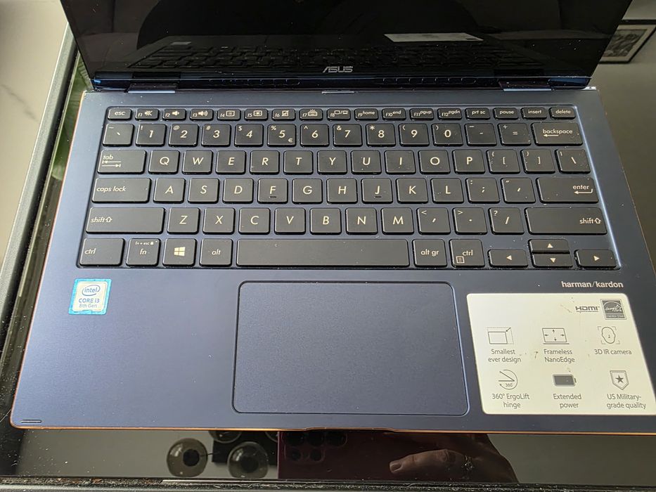 Laptop -tablet asus  niebieski mały stan bardzo dobry