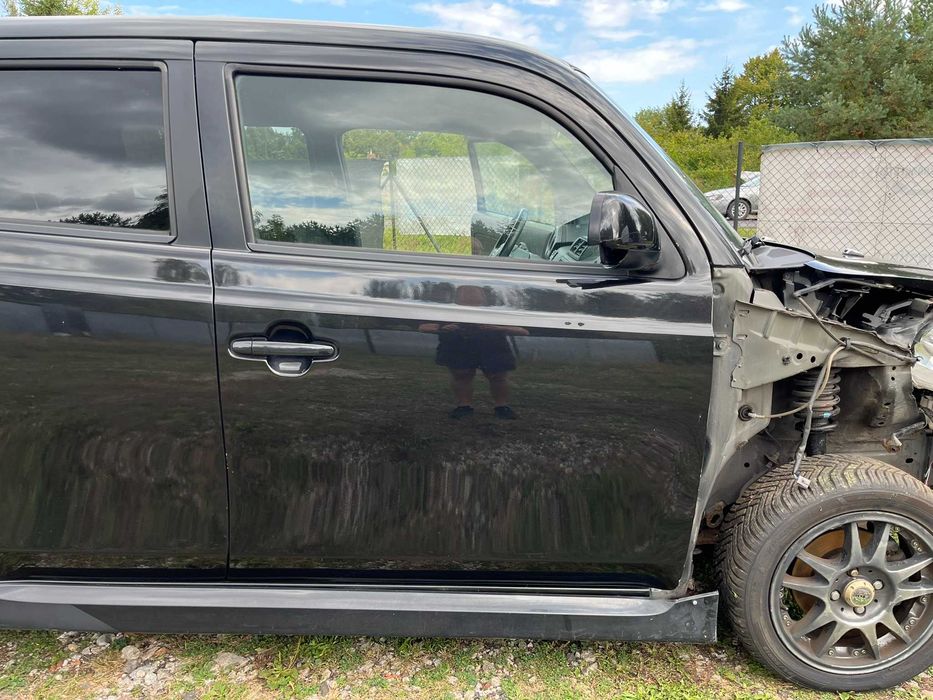 drzwi przód przednie prawe daihatsu materia x07 czarny 2006 - 2011