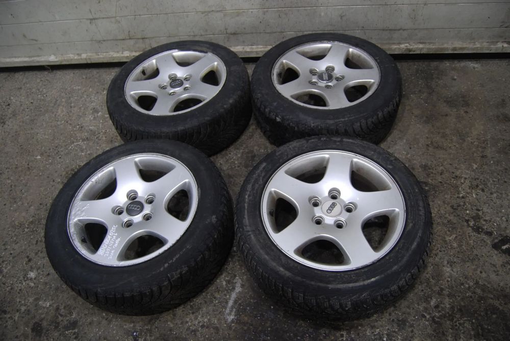 KOŁA FELGI ALUMINIOWE 8D0601025C 5X112 ET45 7J 205/55R16 OPONY ZIMOWE AUDI A6 C5 A4 B6 VW SEAT SKODA