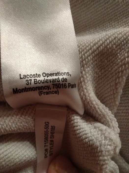 Bluza Lacoste czerwono biało granatowa.